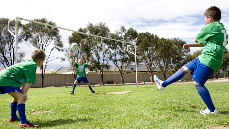 Students playing soccer